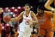 Mar 25, 2014; College Park, MD, USA; Maryland Terrapins forward Alyssa Thomas (25) is defended by Texas Longhorns forward Nekia Jones (21) in the second half of a women's college basketball game in the second round of the NCAA Tournament at Comcast Center
