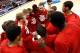 ORLANDO, FL - MARCH 22: Luke Hancock #11 and the Louisville Cardinals huddle before taking on the Saint Louis Billikens in the second half during the third round of the 2014 NCAA Men's Basketball Tournament at Amway Center on March 22, 2014 in Orlando, F