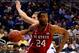 ORLANDO, FL - MARCH 20: T.J. Warren #24 of the North Carolina State Wolfpack drives to the basket against Jake Barnett #30 of the Saint Louis Billikens during the second round of the 2014 NCAA Men's Basketball Tournament at Amway Center on March 20, 2014
