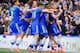 LONDON, ENGLAND - MARCH 22: Andre Schurrle of Chelsea celebrates scoring his second goal with Nemanja Matic, Eden Hazard, David Luiz, Samuel Eto'o, Oscar, Branislav Ivanovic of Chelsea during the Barclays Premier League match between Chelsea and Arsenal