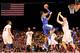 INDIANAPOLIS, IN - MARCH 28: Andrew Harrison #5 of the Kentucky Wildcats shoots the ball against the Louisville Cardinals during the regional semifinal of the 2014 NCAA Men's Basketball Tournament at Lucas Oil Stadium on March 28, 2014 in Indianapolis, I