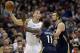Dec 18, 2013; Los Angeles, CA, USA; Los Angeles Clippers power forward Blake Griffin (32) looks to pass under pressure from New Orleans Pelicans point guard Jrue Holiday (11) and power forward Ryan Anderson (33) during the fourth quarter at Staples Cente