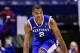 Mar 28, 2014; Indianapolis, IN, USA; Kentucky Wildcats guard Aaron Harrison (2) reacts after making a basket against the Louisville Cardinals in the second half in the semifinals of the midwest regional of the 2014 NCAA Mens Basketball Championship tourna