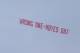 MANCHESTER, ENGLAND - MARCH 29: A plane flies overhead with a banner criticising Manchester United Manager David Moyes during the Barclays Premier League match between Manchester United and Aston Villa at Old Trafford on March 29, 2014 in Manchester, Eng