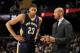 CLEVELAND, OH - JANUARY 28: Head coach Monty Williams of the New Orleans Pelicans talks to Anthony Davis #23 during a break in the action against the Cleveland Cavaliers at The Quicken Loans Arena on January 28, 2014 in Cleveland, Ohio. NOTE TO USER: Use