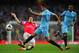 LONDON, ENGLAND - MARCH 29: Tomas Rosicky of Arsenal tackles Gael Clichy of Manchester City during the Barclays Premier League match between Arsenal and Manchester City at Emirates Stadium on March 29, 2014 in London, England. (Photo by Shaun Botterill/G
