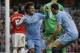 David Silva celebrates giving Manchester City the lead at the Emirates with Edin Dzeko