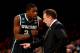 NEW YORK, NY - MARCH 28: Head coach Tom Izzo of the Michigan State Spartans talks with Branden Dawson #22 against the Virginia Cavaliers during the regional semifinal of the 2014 NCAA Men's Basketball Tournament at Madison Square Garden on March 28, 2014