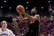 Mar 21, 2014; San Diego, CA, USA; Oklahoma State Cowboys guard Marcus Smart (33) shoots between Gonzaga Bulldogs center Przemek Karnowski (24) and guard David Stockton (11) in the first half of a men's college basketball game during the second round of th