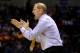 INDIANAPOLIS, IN - MARCH 28: Head coach John Beilein of the Michigan Wolverines shouts to his team in the first half against the Tennessee Volunteers during the regional semifinal of the 2014 NCAA Men's Basketball Tournament at Lucas Oil Stadium on March