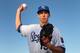 SURPRISE, AZ - FEBRUARY 24: Pitcher Kyle Zimmer #15 of the Kansas City Royals poses for a portrait during spring training photo day at Surprise Stadium on February 24, 2014 in Surprise, Arizona. (Photo by Christian Petersen/Getty Images)