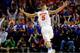 MEMPHIS, TN - MARCH 29: Scottie Wilbekin #5 of the Florida Gators celebrates after hitting a three pointer to end the first half against the Dayton Flyers during the south regional final of the 2014 NCAA Men's Basketball Tournament at the FedExForum on M