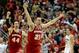 ANAHEIM, CA - MARCH 29: Josh Gasser #21 and Frank Kaminsky #44 of the Wisconsin Badgers celebrate after defeating the Arizona Wildcats 64-63 in overtime during the West Regional Final of the 2014 NCAA Men's Basketball Tournament at the Honda Center on Ma