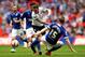 LONDON, ENGLAND - MARCH 30: Danny Swanson of Peterborough is tackled by Ritchie Humphreys of Chesterfield during the Johnstone's Paint Trophy Final between Chesterfield and Peterborough United at Wembley Stadium on March 30, 2014 in London, England. (Ph
