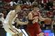 Mar 29, 2014; Anaheim, CA, USA; Wisconsin Badgers forward Frank Kaminsky (right) dribbles against Arizona Wildcats center Kaleb Tarczewski (left) during the first half in the finals of the west regional of the 2014 NCAA Mens Basketball Championship tourna