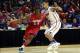 Mar 29, 2014; Memphis, TN, USA; Dayton Flyers guard Jordan Sibert (24) drives against Florida Gators guard Scottie Wilbekin (5) during the second half in the finals of the south regional of the 2014 NCAA Mens Basketball Championship tournament at FedEx Fo