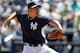 TAMPA, FL - MARCH 16: Masahiro Tanaka #19 of the New York Yankees throws during a spring training game against the Atlanta Braves at George M. Steinbrenner Field on March 16, 2014 in Tampa, Florida. (Photo by Mike Carlson/Getty Images)