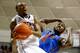 STORRS, CT - DECEMBER 02: Ryan Boatright #11 of the Connecticut Huskies drives to the basket in front of Patric Young #4 of the Florida Gators in the second half during the game at Harry A. Gampel Pavilion on December 2, 2013 in Storrs, Connecticut. (Pho