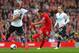 LIVERPOOL, ENGLAND - MARCH 30: Philippe Coutinho of Liverpool scores the third goal during the Barclays Premier League match between Liverpool and Tottenham Hotspur at Anfield on March 30, 2014 in Liverpool, England. (Photo by Alex Livesey/Getty Images