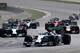 The two Mercedes cars sprint away at the start of the race.
