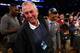 NEW YORK, NY - MARCH 30: Former Connecticut Huskies head coach Jim Calhoun smiles after shaking hands with head coach Kevin Ollie of the Connecticut Huskies after they defeating the Michigan State Spartans to win the East Regional Final of the 2014 NCAA