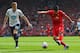 Suarez scores his all-important 29th goal of the season against Tottenham