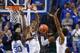 LEXINGTON, KY - NOVEMBER 25: Julius Randle #30, Willie Cauley-Stein #15 and Andrew Harrison #5 of the Kentucky Wildcats defends the shot of Trey Lewis #3 of the Cleveland State Vikings during the game at Rupp Arena on November 25, 2013 in Lexington, Kent