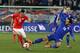 ST GALLEN, SWITZERLAND - MARCH 05: Mate Males of Croatia (R) challenges Josip Drmic of Switzerland (L) during the international friendly match between Switzerland and Croatia at the AFG Arena on March 5, 2014 in St Gallen, Switzerland. (Photo by Marc Eic