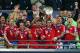 LONDON, ENGLAND - MAY 25: Bastian Schweinsteiger, Thomas Mueller and Philipp Lahm of Bayern Muenchen lift the trophy in celebration alongside team mates after victory in the UEFA Champions League final match between Borussia Dortmund and FC Bayern Muench