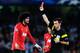 SAN SEBASTIAN, SPAIN - NOVEMBER 05: Marouanne Fellaini of Manchester United is shown a red card by referee Nicola Rizzoli for a challenge during the UEFA Champions League Group A match between Real Sociedad de Futbol and Manchester United at Estadio Anoe