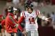 Ole Miss head coach Hugh Freeze (left) and QB Bo Wallace