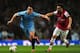 LONDON, ENGLAND - MARCH 29: Samir Nasri of Manchester City and Santi Cazorla of Arsenal battle for the ball during the Barclays Premier League match between Arsenal and Manchester City at Emirates Stadium on March 29, 2014 in London, England. (Photo by