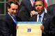 WASHINGTON - MAY 27: U.S. President Barack Obama (R) is presented with a plaque of a bracket by coach Mike Krzyzewski (L) of the Duke Blue Devils during a Rose Garden event May 27, 2010 at the White House in Washington, DC. Obama hosted the NCAA men bask