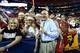 ATLANTA, GA - APRIL 08: ESPN broadcaster Dick Vitale poses with fans before the 2013 NCAA Men's Final Four Championship between the Michigan Wolverines and the Louisville Cardinals at the Georgia Dome on April 8, 2013 in Atlanta, Georgia. (Photo by Andy
