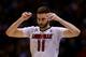 INDIANAPOLIS, IN - MARCH 28: Luke Hancock #11 of the Louisville Cardinals reacts against the Kentucky Wildcats during the regional semifinal of the 2014 NCAA Men's Basketball Tournament at Lucas Oil Stadium on March 28, 2014 in Indianapolis, Indiana. (P