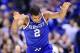 Mar 30, 2014; Indianapolis, IN, USA; Kentucky Wildcats guard Aaron Harrison (2) reacts after making a basket against the Michigan Wolverines in the second half of the finals of the midwest regional of the 2014 NCAA Mens Basketball Championship tournament