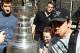Sharks fan Arian Durst (right) with the Stanley Cup.