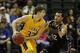 Dec 1, 2013; Orlando, FL, USA; Purdue Boilermakers guard Bryson Scott (12) defends Siena Saints guard Rob Poole (33) during the second half at ESPN Wide World of Sports. Purdue Boilermakers defeated the Siena Saints 68-63. Mandatory Credit: Kim Klement-US