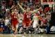 ANAHEIM, CA - MARCH 29: Josh Gasser #21 and Frank Kaminsky #44 of the Wisconsin Badgers celebrate after defeating the Arizona Wildcats 64-63 in overtime during the West Regional Final of the 2014 NCAA Men's Basketball Tournament at the Honda Center on Ma