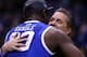 INDIANAPOLIS, IN - MARCH 30: head coach John Calipari of the Kentucky Wildcats celebrates with Julius Randle #30 after defeating the Michigan Wolverines 75 to 72 in the midwest regional final of the 2014 NCAA Men's Basketball Tournament at Lucas Oil Stad