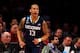 NEW YORK, NY - MARCH 28: Shabazz Napier #13 of the Connecticut Huskies reacts after hitting a three pointer in the first half against the Iowa State Cyclones during the regional semifinal of the 2014 NCAA Men's Basketball Tournament at Madison Square Gar