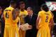 NEW YORK - NOVEMBER 19: Head coach Mike Montgomery of the California Golden Bears goes over a play during a timeout against the Syracuse Orange during their semifinal game of the 2K Sports Classic on November 19, 2009 at Madison Square Garden in New Yor