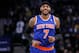 Mar 30, 2014; Oakland, CA, USA; New York Knicks forward Carmelo Anthony (7) smiles on the court against the Golden State Warriors in the first quarter at Oracle Arena. Mandatory Credit: Cary Edmondson-USA TODAY Sports