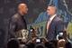 The Rock and John Cena stare each other down at last year's press conference.
