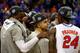 MEMPHIS, TN - MARCH 29: Will Yeguete #15, Scottie Wilbekin #5 and Casey Prather #24 of the Florida Gators celebrate on the court after defeating the Dayton Flyers 62-52 in the south regional final of the 2014 NCAA Men's Basketball Tournament at the FedExF