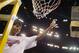 NEW ORLEANS - APRIL 7: Carmelo Anthony #15 of Syracuse cuts down the net after he and his team defeated Kansas 81-78 during the championship game of the NCAA Men's Final Four Tournament on April 7, 2003 at the Louisiana Superdome in New Orleans, Louisian