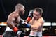 CARSON, CA - MARCH 16: WBO Welterweight Champion Timothy Bradley (L) lands a punch against contender Ruslan Provodnikov during their WBO Welterweight Championship boxing match at The Home Depot Center on March 16, 2013 in Carson, California. Bradley ret