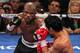 LAS VEGAS, NV - JUNE 09: (L-R) Timothy Bradley lands a left to the head of Manny Pacquiao during their WBO welterweight title fight at MGM Grand Garden Arena on June 9, 2012 in Las Vegas, Nevada. (Photo by Jeff Bottari/Getty Images)