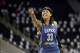 Oct 10, 2013; Atlanta, GA, USA; Minnesota Lynx guard Seimone Augustus (33) talks to a teammate against the Atlanta Dream in the third quarter at the Arena at Gwinnett Center. The Lynx defeated the Dream 86-77 to win the WNBA Championship. Mandatory Credit