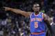 Mar 30, 2014; Oakland, CA, USA; New York Knicks guard Tim Hardaway Jr. (5) gestures from the court against the Golden State Warriors in the second quarter at Oracle Arena. Mandatory Credit: Cary Edmondson-USA TODAY Sports